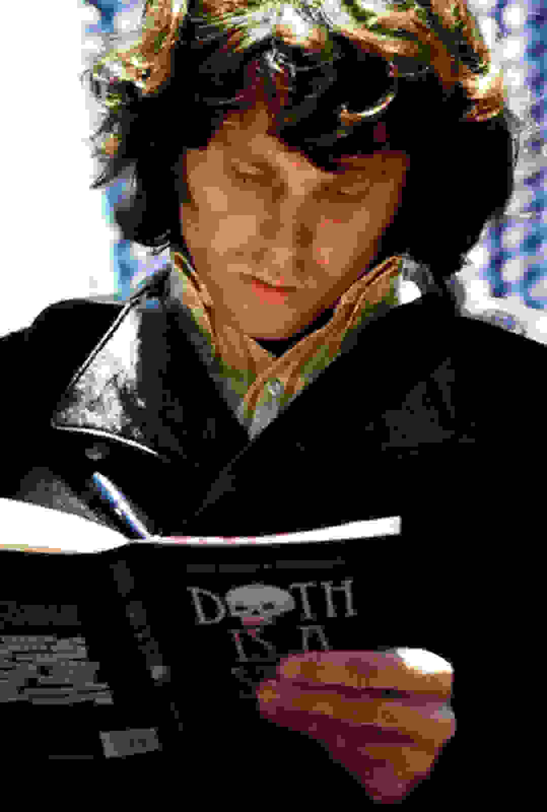 Jim-Morrison-Reading-His-Favorite-Book
