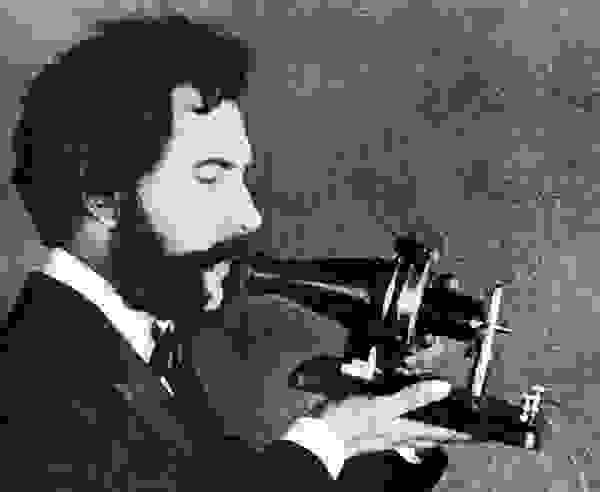 alexander-graham-bell-speaking-into-early-telephone-1876.jpg