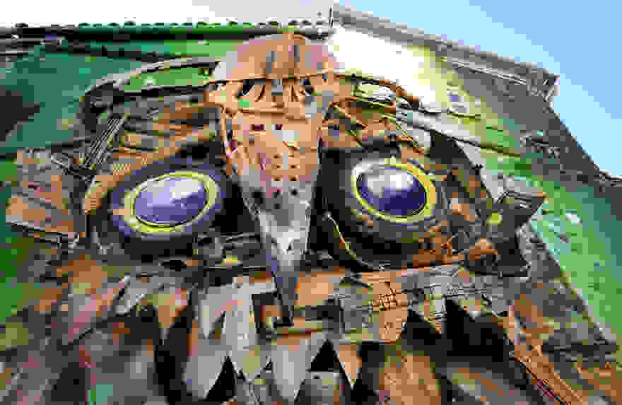 recycled-owl-sculpture-street-art-owl-eyes-artur-bordalo-4.jpg