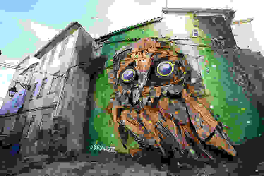recycled-owl-sculpture-street-art-owl-eyes-artur-bordalo-7.jpg